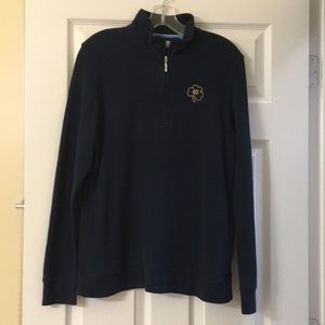 Navy crewneck sweater with Notre Dame seal.